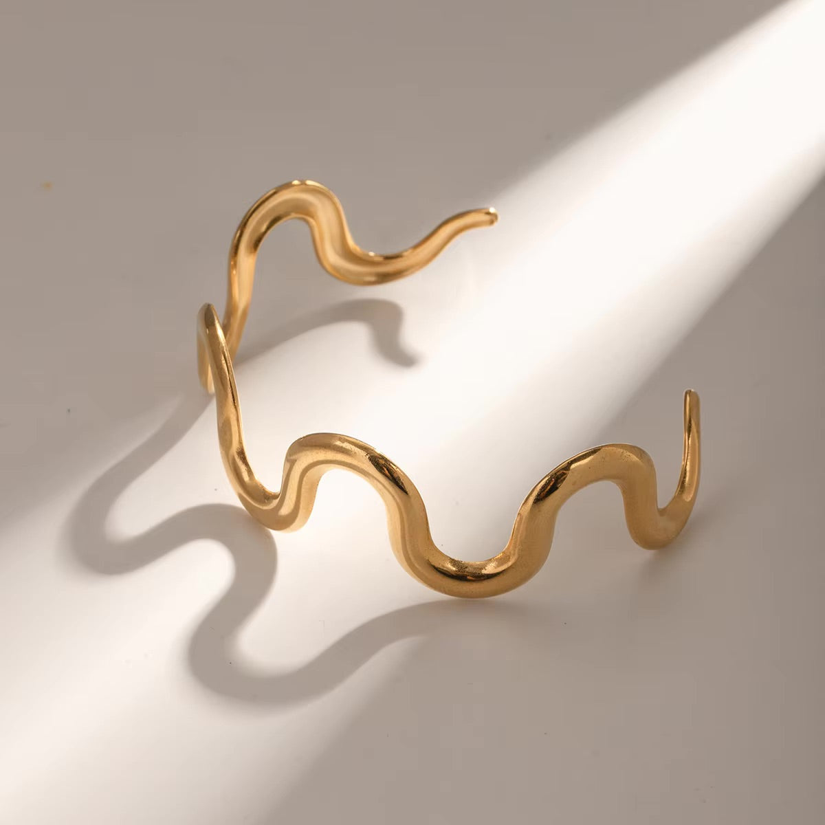 Twisted Gold Bangle by Senna