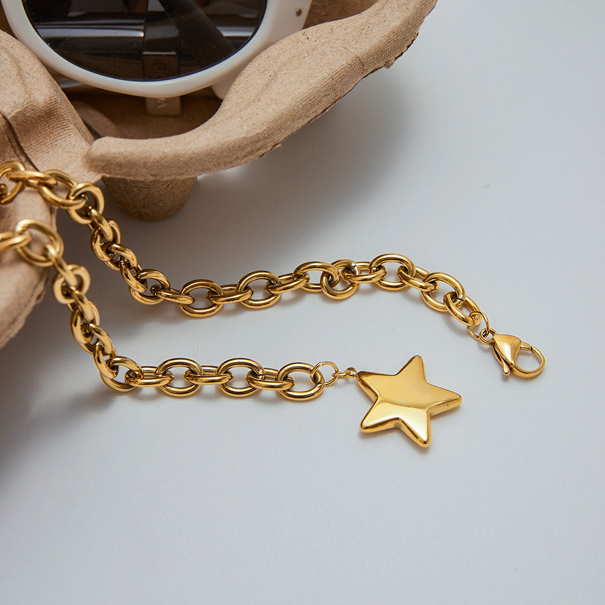Gold Star Pendant by Stellaria
