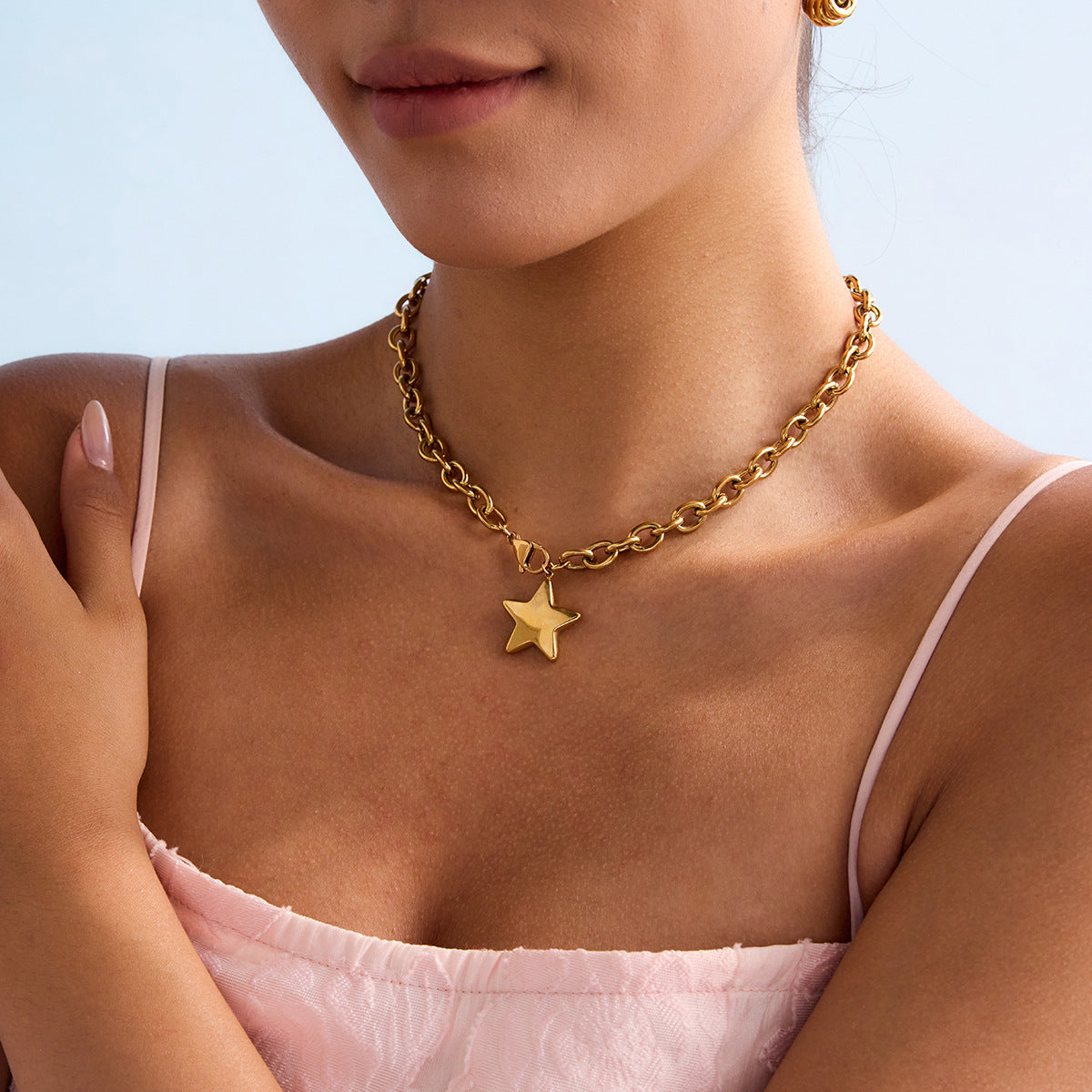 Gold Star Pendant by Stellaria