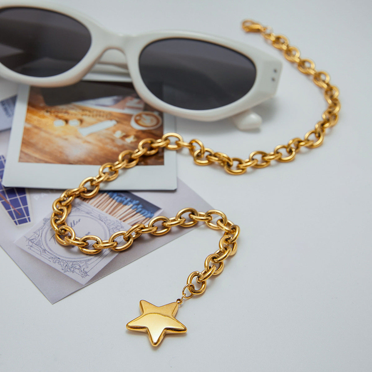 Gold Star Pendant by Stellaria